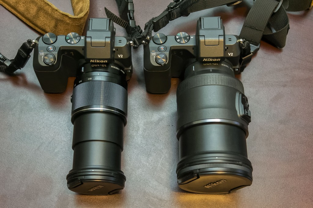 When fully extended the 1 Nikon 10-100mm f/4-5.6 and 10-100 f/4.5-5.6 PD zoom are about the same overall length.