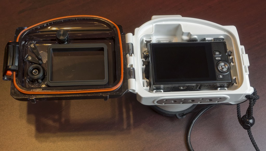 Nikon 1 J4 with 10-30mm f/3.5-5.6 lens (or the 11-27.5mm lens) fits snugly into the WP-N3 waterproof housing.