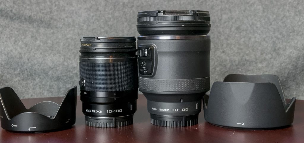1 Nikon 10-100mm f/4.5-5.6 PD (right side) and 1 Nikon 10-100mm f/4-5.6 (left side)