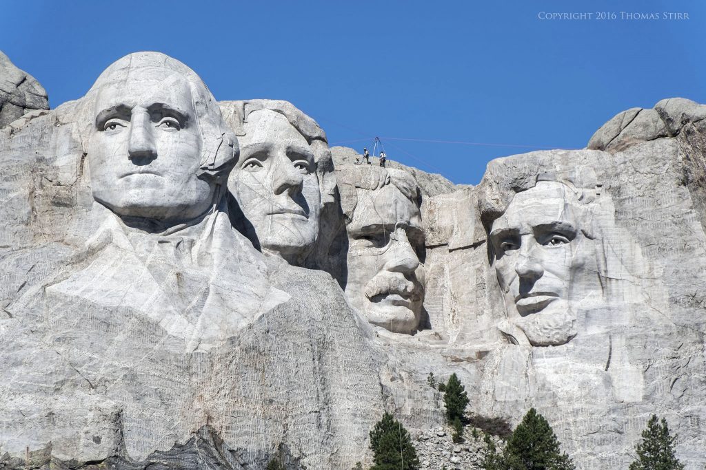 Nikon 1 J5 + 1 Nikon 10-100mm f/4-5.6 @ 100mm, efov 270mm, f/5.6,1/1250 sec, ISO-160. Mount Rushmore, South Dakota.
